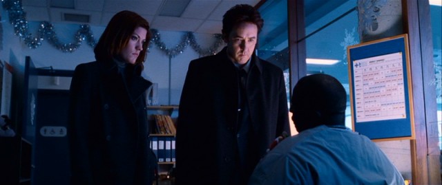In a hospital decorated for the holidays, Kelsey (Jennifer Carpenter) and Mike (John Cusack) question an associate and accomplice of the Buffalo serial killer.