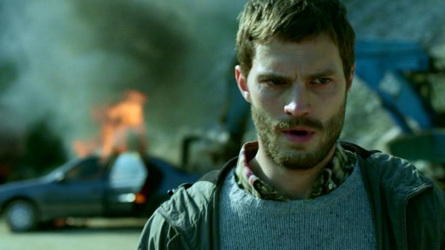 Hunted serial killer Paul Spector (Jamie Dornan), seen here coolly walking away from an exploded car, is the series' other focus.