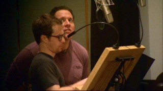 We get a brief glimpse of Sam Rockwell and Jon Favreau recording their parts together in the "G-Farce" bloopers reel.