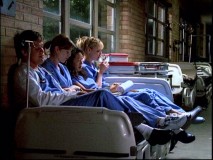The interns regularly gather in this dark, quiet corner of the hospital, but this particular sequence was deleted from the pilot.