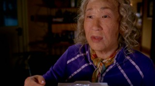 After being impaled by an icicle, Cristina (Sandra Oh) imagines life as an old woman.