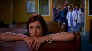 Returning from her "Private Practice", kneeling Dr. Addison Montgomery (Kate Walsh) is thought to be deep in prayer, but she definitely hears the chatter from the back of the chapel.