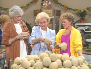 The girls disagree on the best way to pick a cantaloupe.