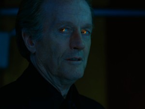Jeepers, Peter, where'd you get those peepers? (In case the black suit, thunder, and demon-shaped shadow didn't tip you off, Peter Fonda's orange eyes let you know that he's the devil.)