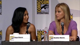 Just like Glee Club, Naya Rivera and Heather Morris sit next to each other at the show's Comic-Con panel.