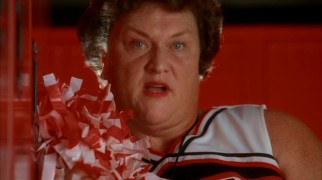 Coach Bieste (Dot-Marie Jones) materializes in student's sexual cool-off images, a fact that somehow gets shared with her.