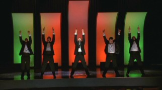 Will's new a capella group, the Acafellas show off what they could do at the school's faculty meeting of all places.