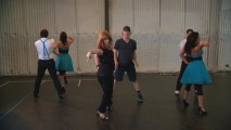 In "Staying in Step with Glee," choreographers Zach Woodlee and Brooke Lipton break down Vocal Adrenaline's "Bohemian Rhapsody" dance.