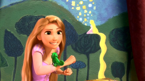 Rapunzel and her chameleon pal Pascal embrace adventure in Disney's "Tangled."