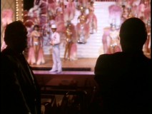 Dark silhouettes were used in this deleted Part II scene, in which Al Neri (Richard Bright, right) humiliates a recalcitrant Las Vegas hotel owner in front of his stage performers.