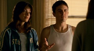 Angie Gennaro (Michelle Monaghan) and Patrick Kenzie (Casey Affleck) aren't dressed in the most professional attire when their services are sought by a missing girl's family.
