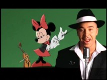 A little bit of Minnie in his life: one-hit wonder Lou Bega performs "Disney's Mambo No. 5" in this included music video.