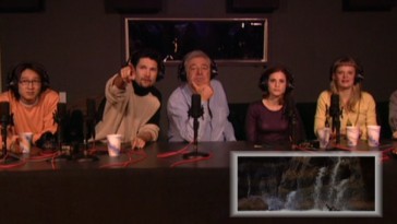 All the Goonies reunite with Richard Donner and occasionally appear onscreen for their commentary. Seen here are Ke Huy Quan, Corey Feldman (pointing out which holes they were allowed to slide out of), Donner, Kerri Green, and Martha Plimpton.