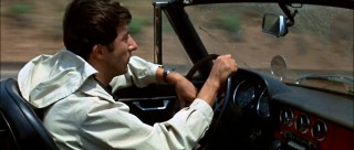 "And here's to you, Mrs. Robinson"... Ben shatters the speed limit in pursuing what he believes to be his dream girl.