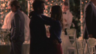 Rusty and Jordan (Johanna Braddy) finally get to spend a quiet moment alone together during the wedding reception of a former ZBZ member.
