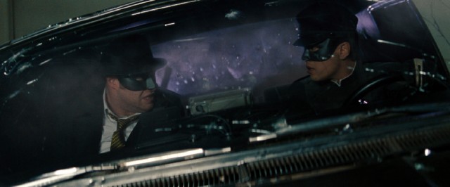 Self-made Los Angeles superheroes The Green Hornet (Seth Rogen) and Kato (Jay Chou) collect their thoughts in the midst of climactic action.