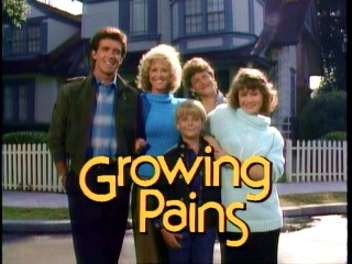 Show me that smile again (show me that smile)... The Seavers pose jovially outside their Long Island home in the "Growing Pains" opening title sequence.