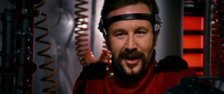 The one Lilliputian not charmed by Gulliver, General Edward (Chris O'Dowd) takes matters into his own hands by assuming the controls of a giant robot about six feet tall.