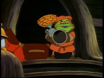 This troll takes a break from disrupting Internet forums to whoop the Gummi Bears in "A Tree Grows in Dunwyn."