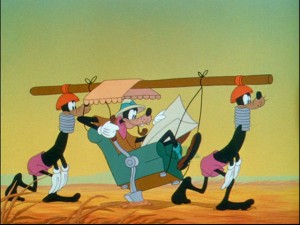 Goofy arrives in a very Goofy caravan!