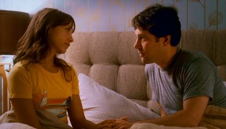 Zooey (Rashida Jones) listens as Peter (Paul Rudd) comes clean about his series of man dates.