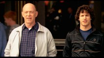 Peter's father Oz (J.K. Simmons) and younger brother Robbie (Andy Samberg) appear in an extended version of a scene from which they're absent in the film.
