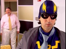 Self-appointed superhero The Revenger learns the truth from his stepdad/boss in a "Power" sketch.
