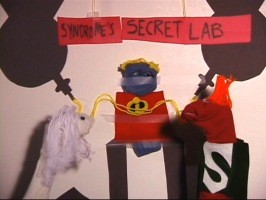 Low-tech Mirage, Mr. Incredible, and Syndrome in a scene from the puppet show Easter Egg.