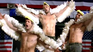 Dennis (Glenn Howerton), Mac (Rob McElhenney), and Charlie (Charlie Day) try to rev the crowd as the most patriotic of wrestling teams: the Birds of War.