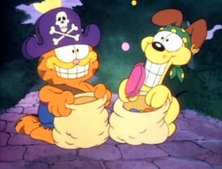 Garfield and Odie go trick-or-treating for candy, candy, candy in "Garfield's Halloween Adventure."