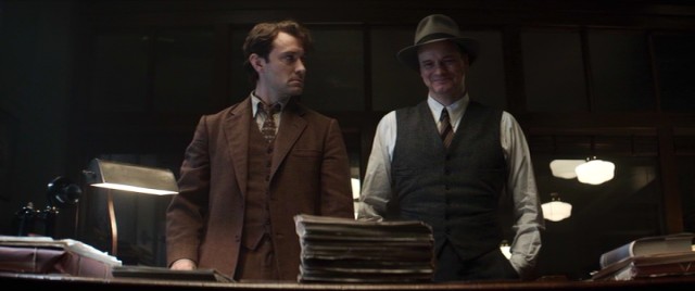 A last-minute title change from Thomas Wolfe (Jude Law) puts a smile on the face of his editor Max Perkins (Colin Firth).