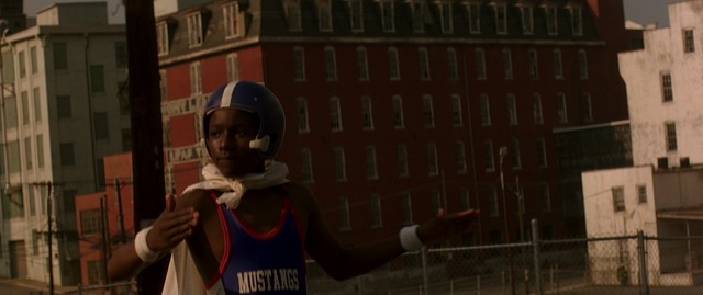 Dressed in a cape, helmet, and wrestling uniform, George Richardson (Donald Holden) takes it upon himself to keep his town of New Street safe in the 2000 film "George Washington."