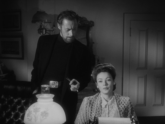 Captain Gregg (Rex Harrison) dictates to Lucy (Gene Tierney) the unvarnished story of his life as a seaman in "The Ghost and Mrs. Muir."