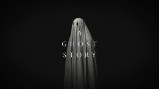 The ghost acts against black on the A Ghost Story Blu-ray menu.
