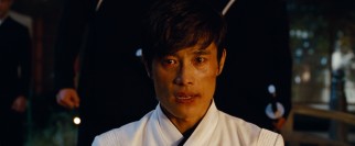 Snake Eyes is framed for the assassination and arrested, but inside his helmet is really Storm Shadow (South Korean actor Byung-Hun Lee).