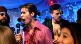 Rob (a young Sam Rockwell) fronts the guys' obligatory band.