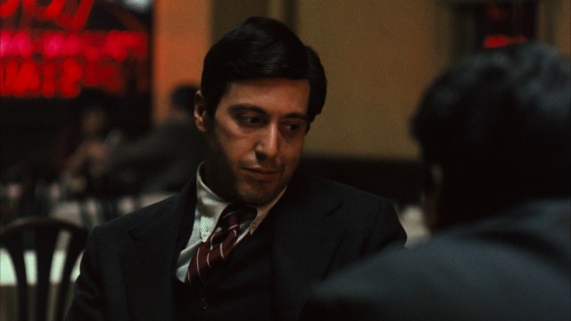 Michael Corleone (Al Pacino) meets with a police chief and a rival crime family's head at Louis Restaurant in a pivotal scene.