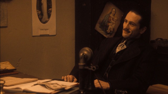 The young Vito Corleone (Robert De Niro) rises to power in 1910s New York in the elder narrative of "The Godfather Part II."