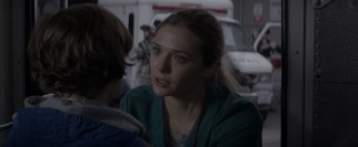 Nurse Elle Brody (Elizabeth Olsen) worries about her son, her husband, and human civilization at large.