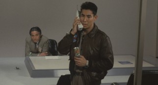A tiny can of soda and a large cellular phone was the height of cool in 1989 Japan.