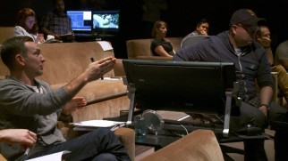 Director Peter Sohn gives feedback to animators at a shot briefing.