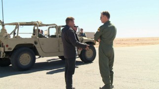 Andrew Niccol directs Bruce Greenwood on the desert set of "Good Kill."