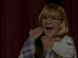 I bet this sneak attack gave Glasses Girl here (Jessica Moyes) goosebumps; you just can't see them under all that awesome plaid.