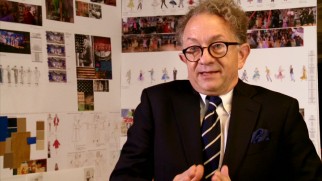 William Ivey Long is excited to talk about his costume designs, drawings of which adorn the wall behind him in "Greasin' Up the Joint."
