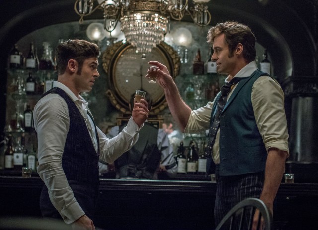 P.T. Barnum (Hugh Jackman) sees business take off after entering into a partnership with stage producer Phillip Carlyle (Zac Efron).