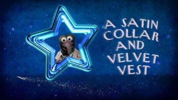 Gonzo appears next to a satin collar and velvet vest in the "Steppin' Out with a Star" Frog-E-Oke lyrics video.
