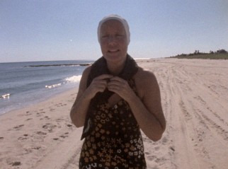 Little Edie hits the beach and keeps her head covered in "The Beales of Grey Gardens."