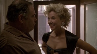 Myra Langtry (Annette Bening) uses her body to get out of paying the rent she owes to her landlord (Gailard Sartain).