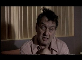 Director Stephen Frears looks like he could use some sunlight and fresh air in "The Making of 'The Grifters.'"