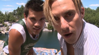 Focal frat boys Taylor Lautner and Milo Ventimiglia mug for the camera and show off their frat boy handshake in "Look Who Stopped By."